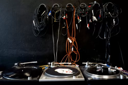 A photo of cables hanging on the walls at Kommunal Dubplate Service
