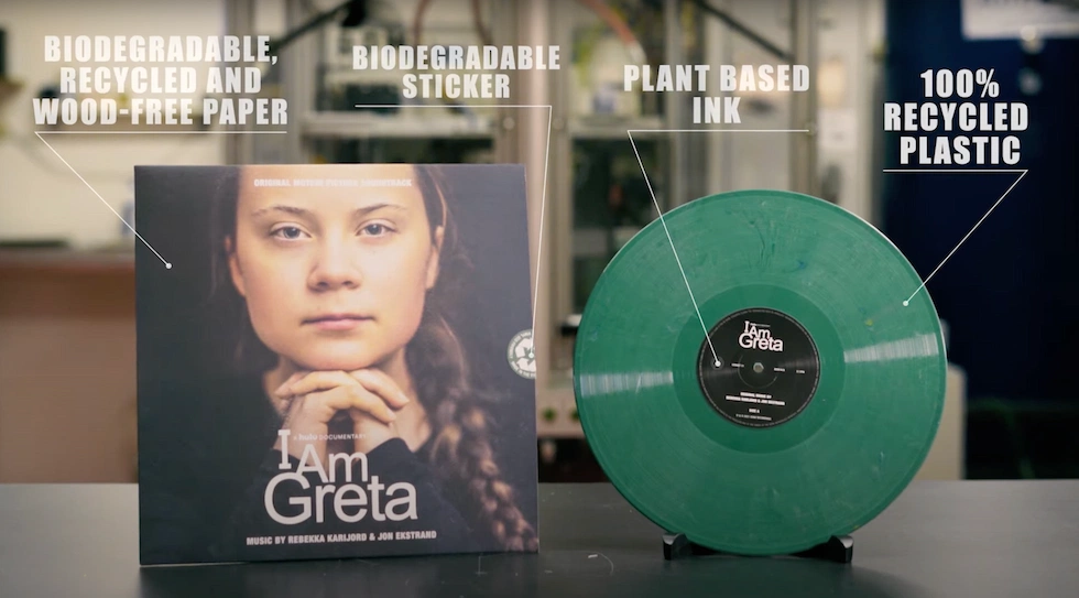 Image of COO, Mathias, inspecting a freshly pressed record.
